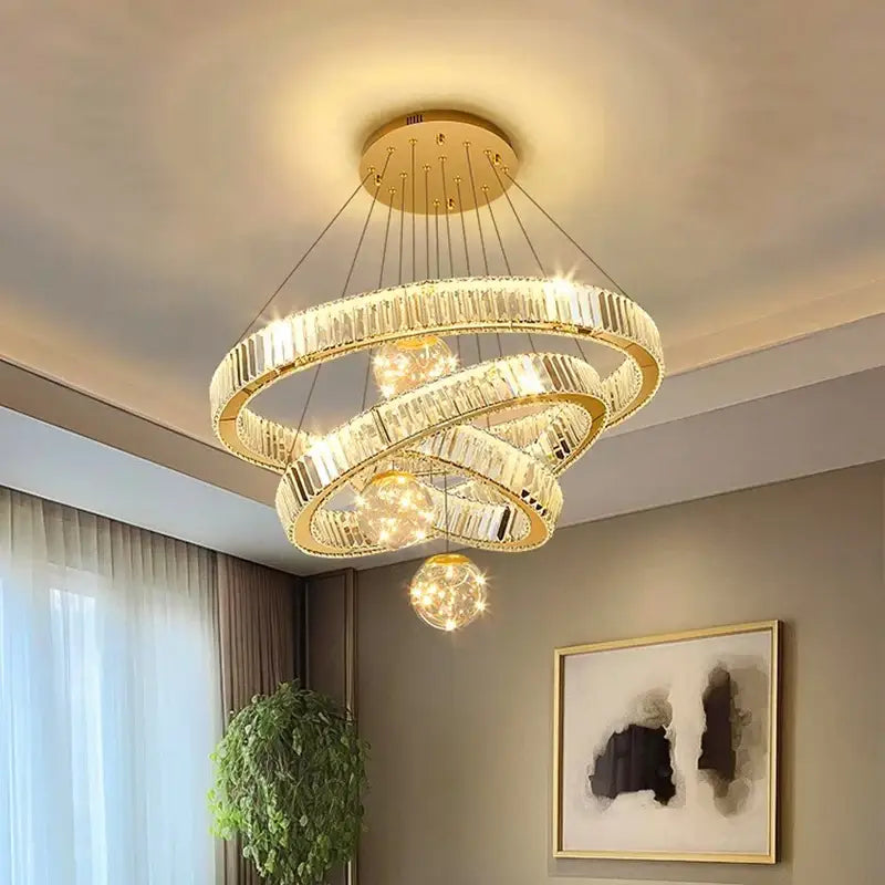 Modern gold crystal multi ring pendant light with golden spiral chandelier and brushed stainless finish for dining room