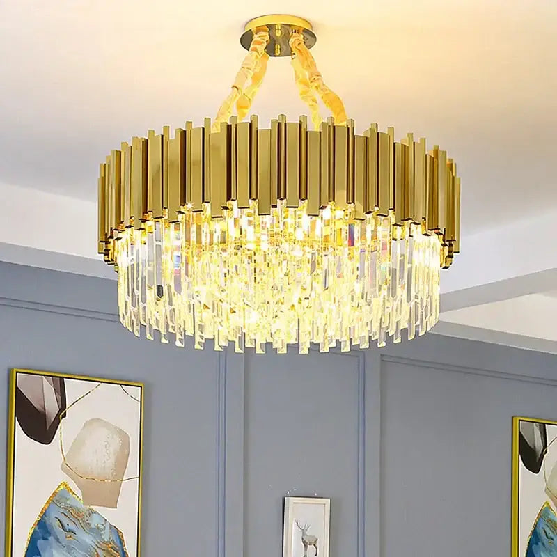Modern gold decorbites crystal oval chandelier with vertical metallic bars and cascading prisms for living room lighting
