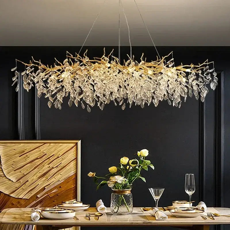 Modern gold crystal pendant chandelier featuring a golden branch design with dangling crystal leaves for luxury decorbites decor