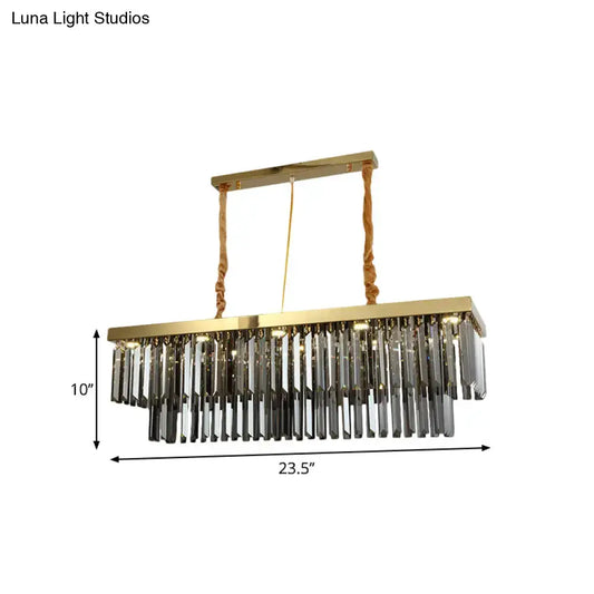 Decorbites modern gold pendant light with rectangular frame and cascading clear crystal prisms suspended by twisted ropes