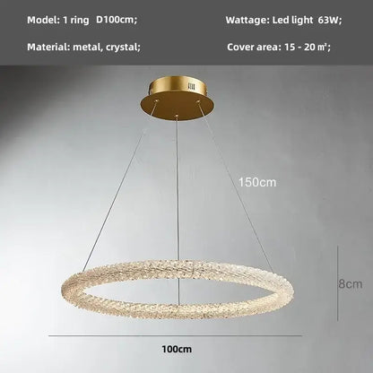 Modern gold crystal pendant lights featuring a gold-toned circular chandelier with metallic ring and crystal embellishments