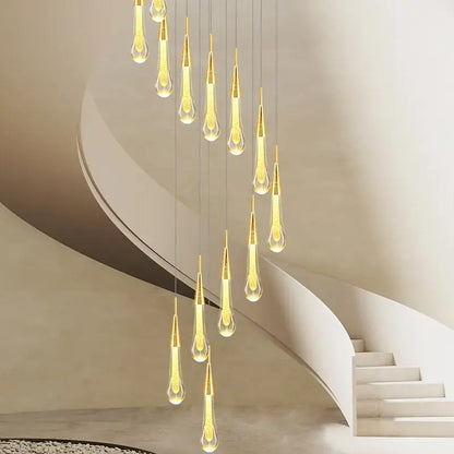 Modern gold crystal raindrop pendant lights with clear glass and etched patterns designed for foyer chandelier use