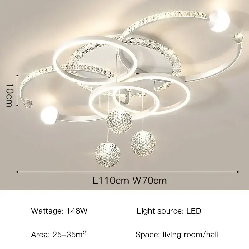 Modern white and crystal dimmable led pendant light with interlocking rings and dangling spherical ornaments for dining room