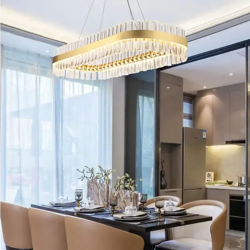 Modern gold crystal ring chandelier with rectangular frame and cascading clear crystal prisms for dining room use