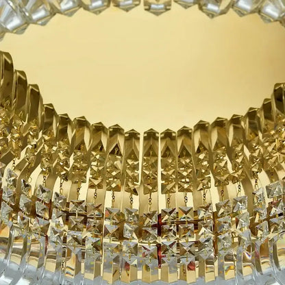 Modern gold crystal ring led ceiling lamp featuring a luxurious gold-toned chandelier with cascading crystal prisms