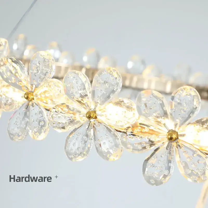Modern gold crystal ring led chandelier with clear crystal flower pendants and metallic frame for dining room decorbites crystal ring