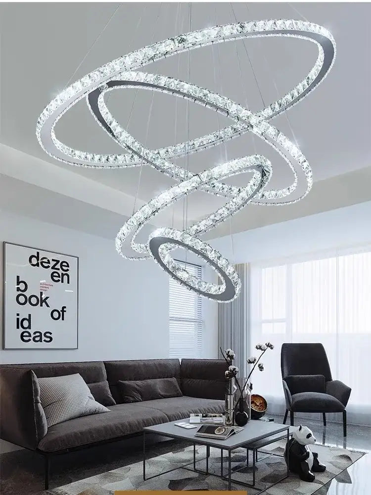 Modern gold crystal rings pendant light featuring interlocking crystal rings for elegant living room decorbites crystal rings chandelier