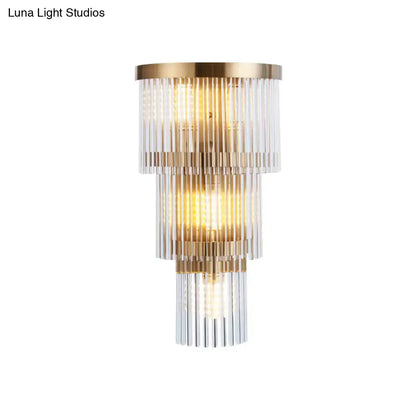 Modern gold crystal rod tiered wall lamp with cascading clear glass rods and gold-toned metal accents for dining room lighting