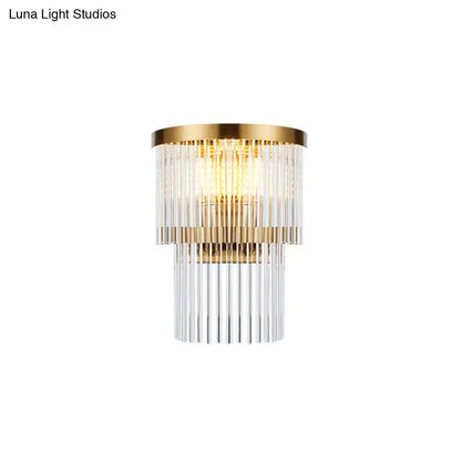 Modern gold wall lamp with tiered crystal rod design featuring cascading clear glass rods for dining room lighting