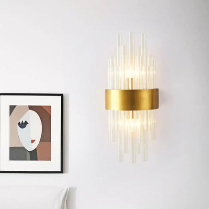 Modern gold crystal rod wall sconce with clear glass rods radiating from a circular base for 110v-120v use