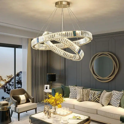 Modern gold crystal round ceiling chandelier with clear crystal segments and blue accents for dining room decorbites crystal round