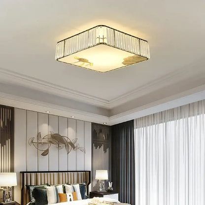 Modern gold crystal round ceiling light with clear crystal panels and gold-toned decorative fish motifs for bedroom decorbites crystal round ceiling