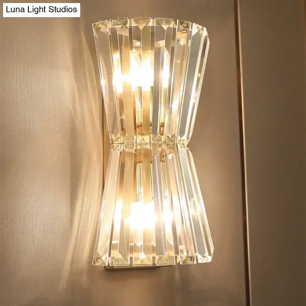 Modern gold crystal shade wall mounted light with clear vertical faceted panels and sleek corridor sconce design