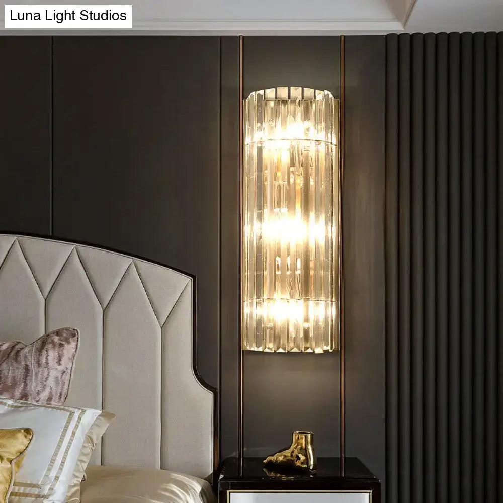 Modern gold crystal shade wall scone with vertical prisms and warm glow for living room led incandescent fluorescent use