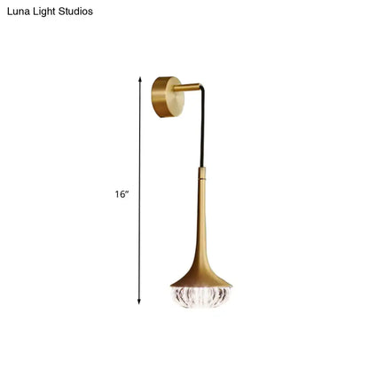 A sleek 16-inch gold crystal wall lamp with a slender curved arm and faceted glass shade for modern bedrooms