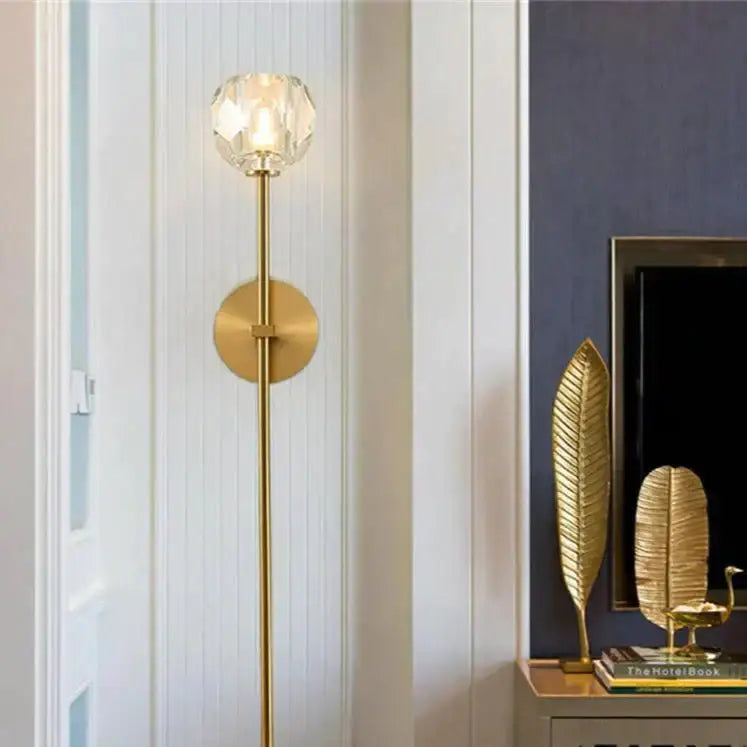 Decorbites™ ivy crystal wall lamp featuring a polished gold finish and a faceted crystal globe top for elegant lighting