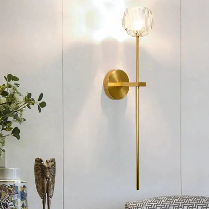 Gold-toned DecorBites Ivy wall lamp featuring a faceted crystal globe shade as a stylish crystal wall lamp