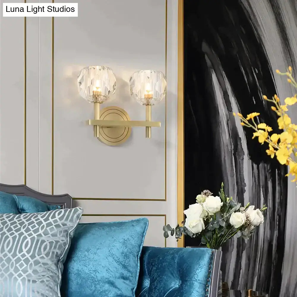 Gold-toned DecorBites™ Ivy wall lamp featuring two faceted crystal shades as a refined crystal wall lamp