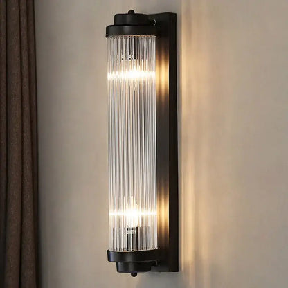 Modern gold crystal wall lamp with black frame and vertical ribbed glass panels for bedroom decorbites crystal wall use