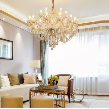 A luxurious modern gold decorbites crystal chandelier with multiple tiers of hanging crystals for living room decor