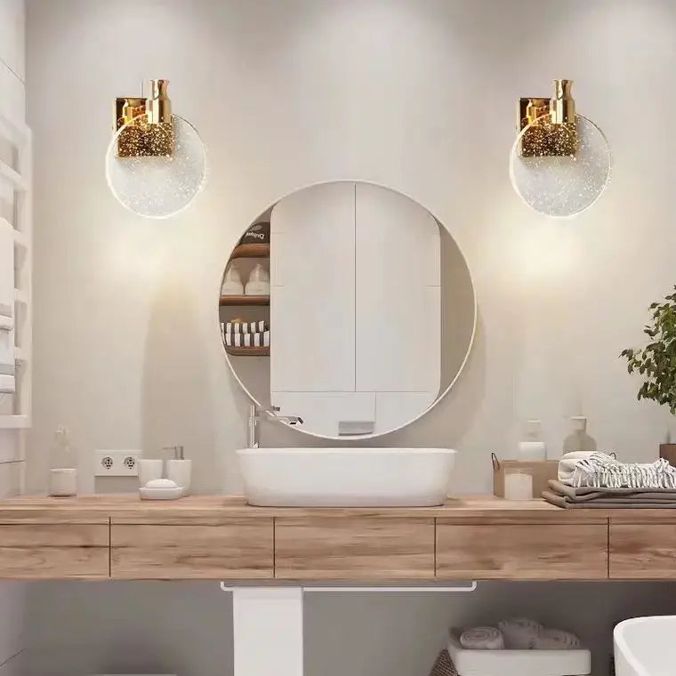 Modern gold crystal wall lamp with clear glass globe sconces flanking a round mirror for elegant wall decorbites crystal wall use