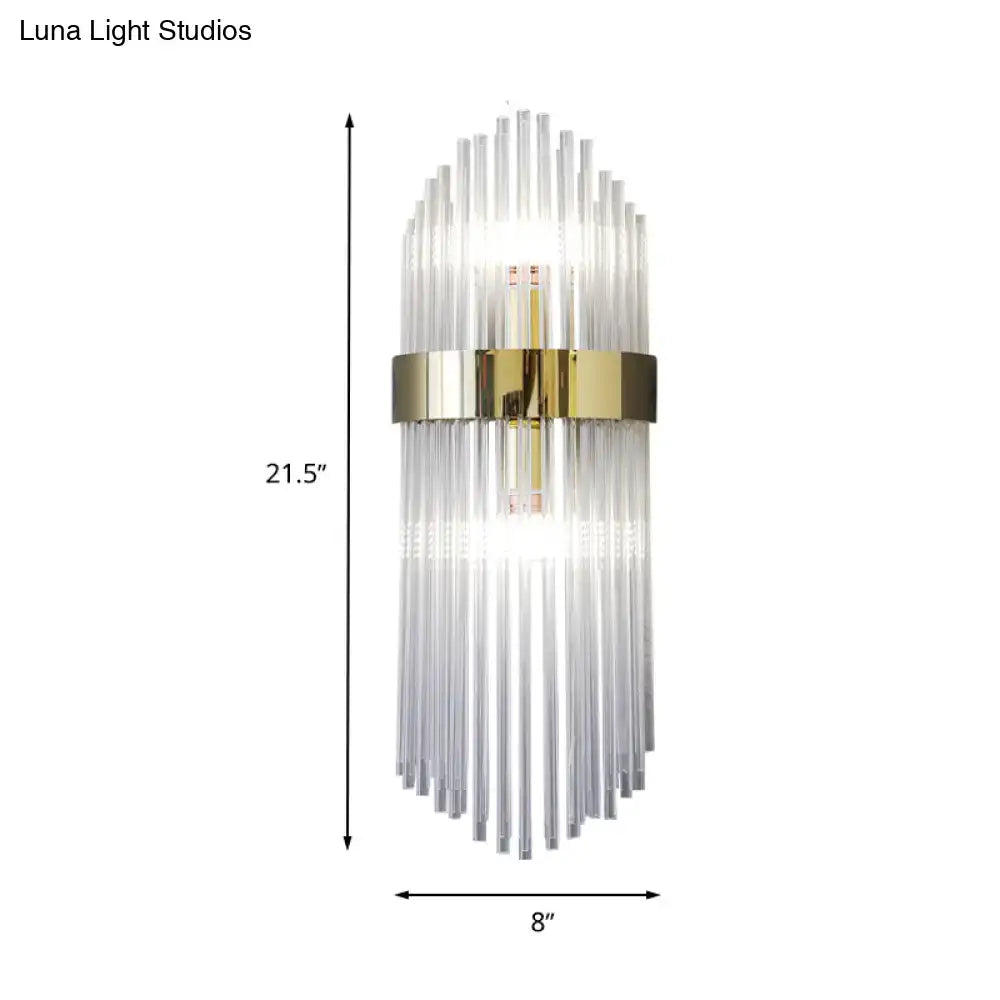 Modern gold crystal wall lamp with a central metal frame and glass rods perfect for living room lighting