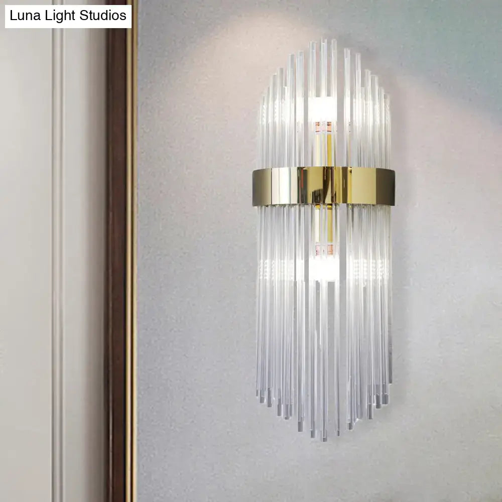 Modern gold crystal wall lamp with clear glass rods and polished metal bands for living room lighting