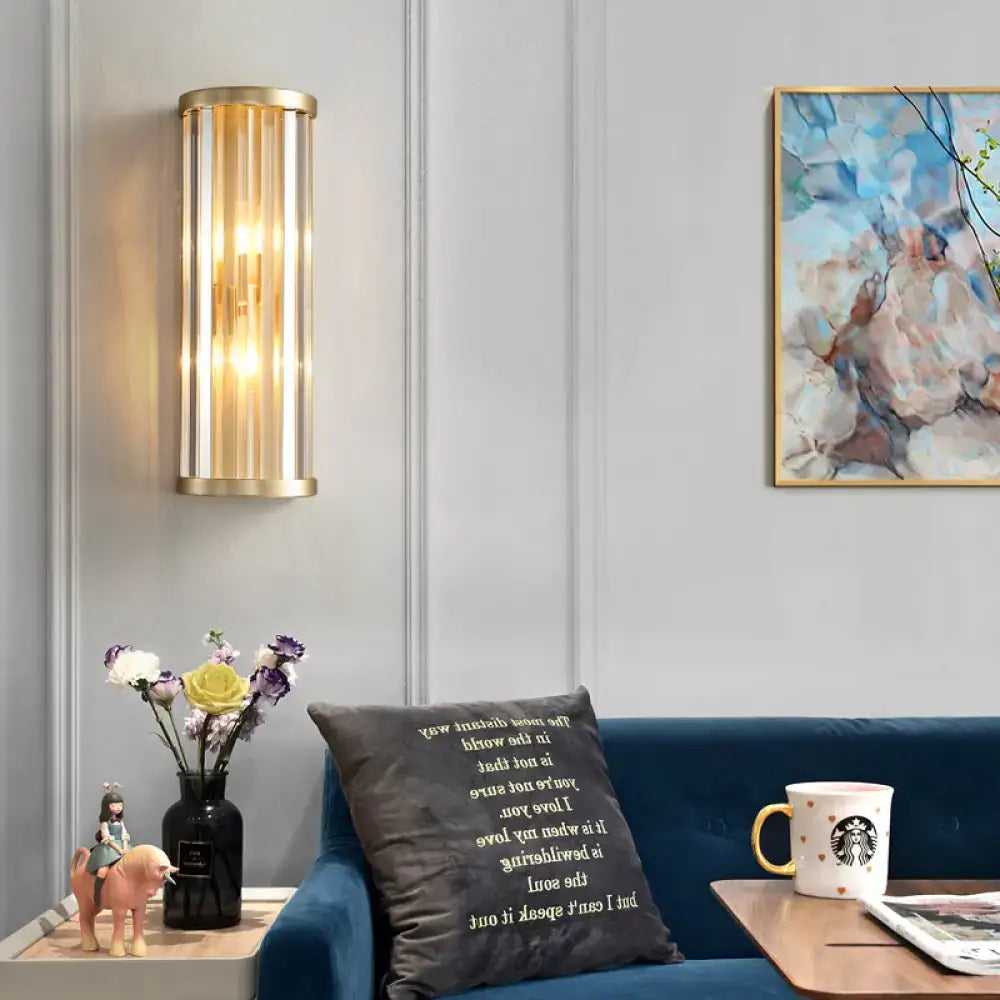 Modern gold crystal wall lamp two lights featuring gold-toned cylindrical wall sconce with vertical glass panels and warm led lighting