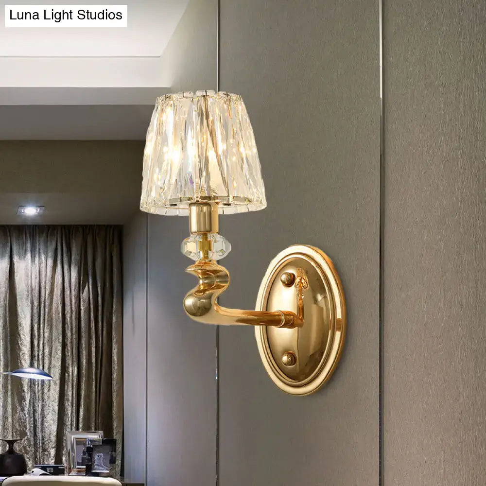 Modern gold crystal wall light fixture with faceted crystal shade for bedroom lighting and decor