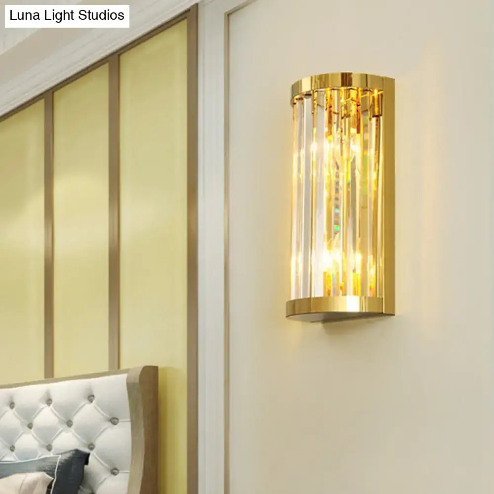 Modern gold crystal wall mount lighting featuring vertical crystal rods for elegant bedroom wall mount use