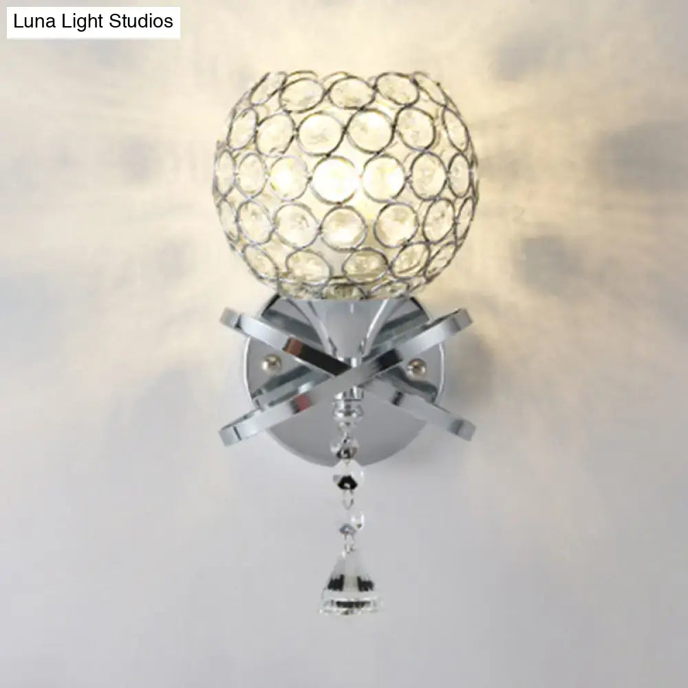 Chrome finished wall light with spherical crystal globe and dropped crystal ball bell-shaped pendant for bedroom use