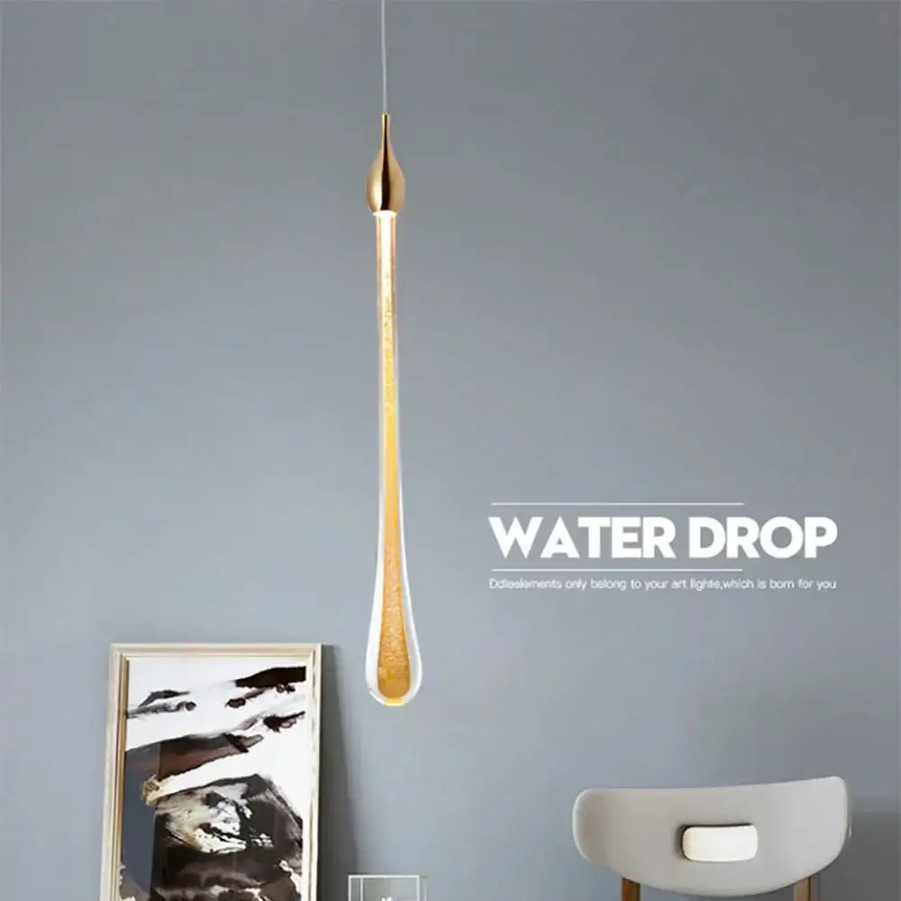 Modern gold crystal water drop chandelier bedroom pendant light features a sleek translucent glass water drop design