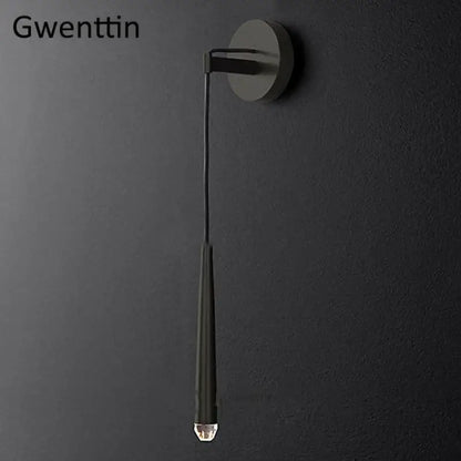 Modern matte black wall sconce with elongated cylindrical shade and crystal water drop accent for decorbites crystal water drop lighting