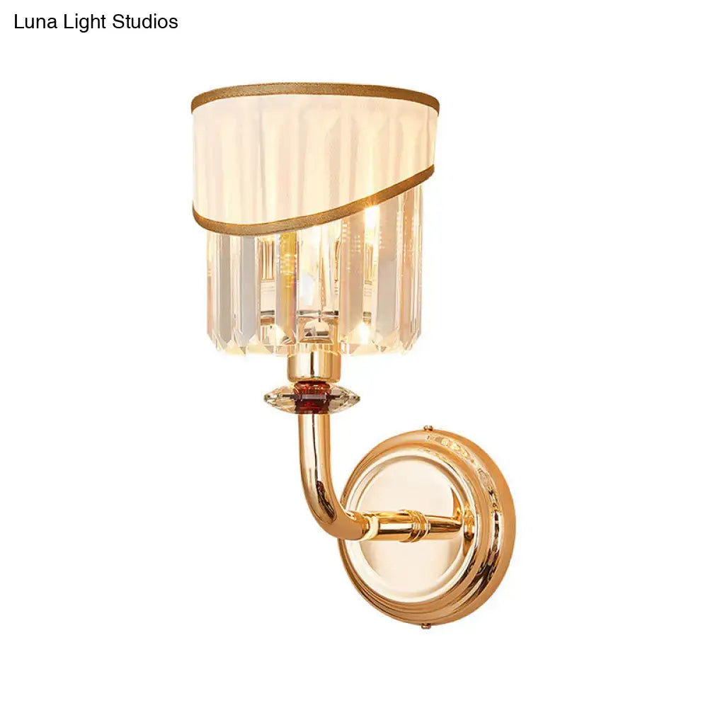 Modern gold curved arm wall light with e12 e14 base featuring fluted crystal shade and decorative gold trim bedroom sconce