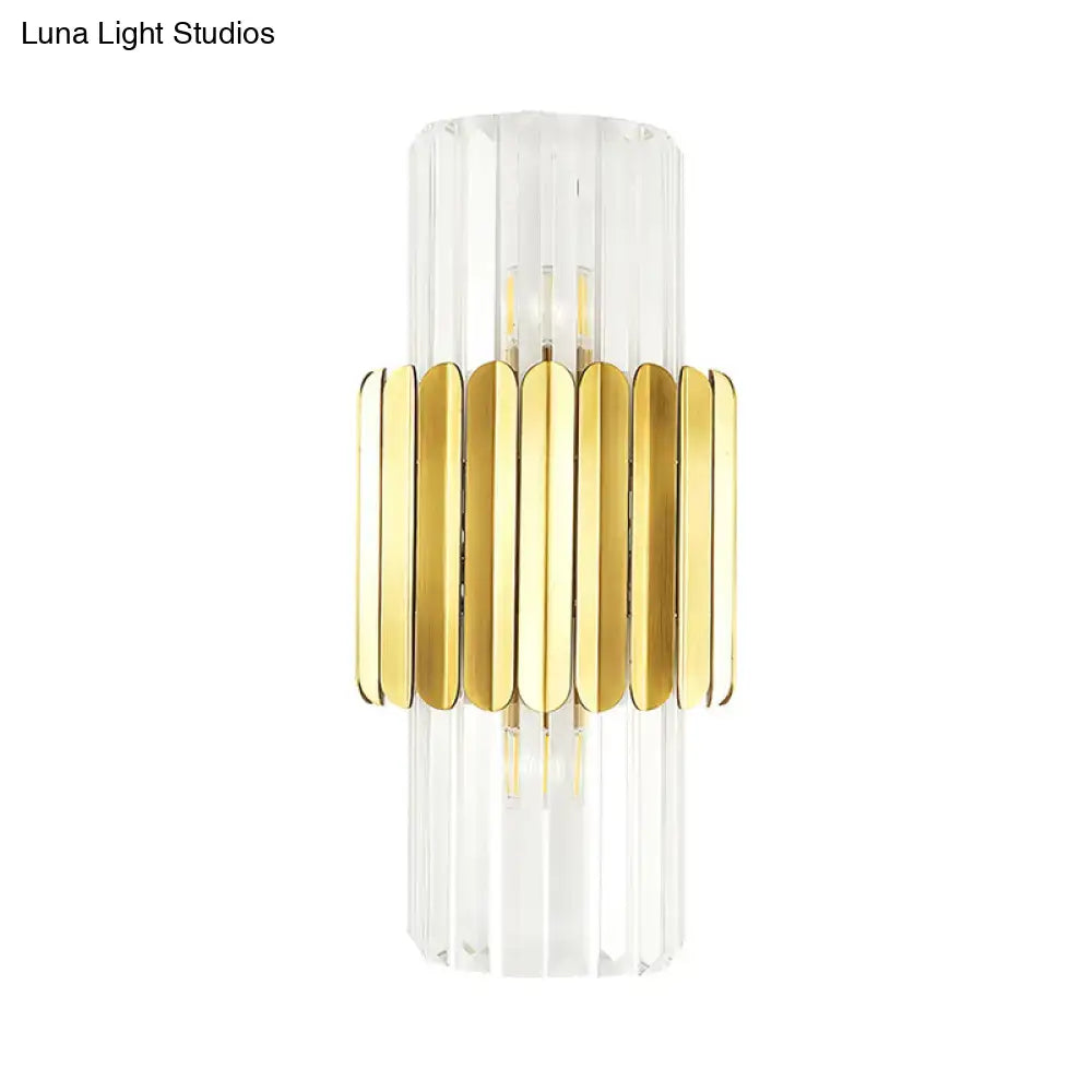 Elegant modern gold cylinder wall mount lamp with crystal faceted glass panels and metallic band for bedroom lighting