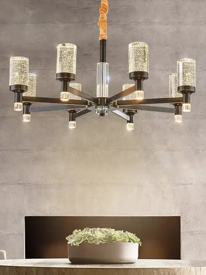 Modern gold decorbites bubble crystal chandelier with dark metal frame and cylindrical glass shades for living room lighting