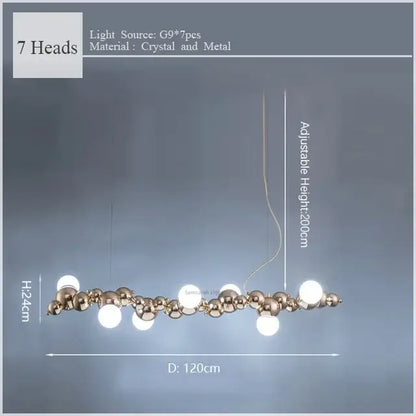 Modern gold decorbites caterpillar metal pendant light with seven spherical crystal and metal heads in linear design