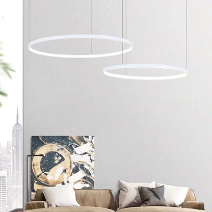 Two minimalist white circular led pendant lights from the modern gold decorbites circular led chandelier for dining room use