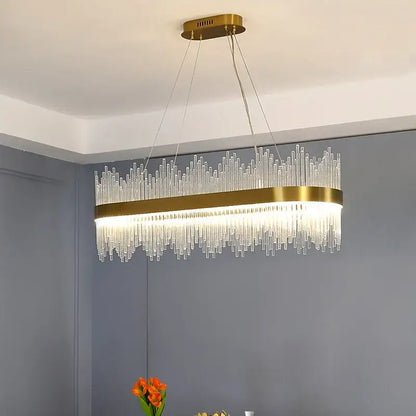 Modern gold decorbites crystal chandelier with oval metal frame and cascading clear glass rods for living room lighting