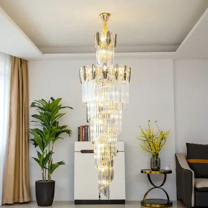 Modern gold decorbites crystal chandelier with clear prisms and gold accents for staircase and living room lighting