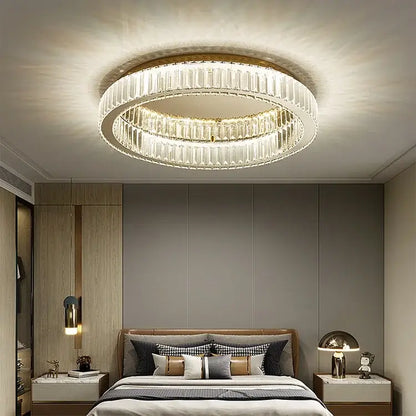 Modern gold decorbites crystal circle ceiling chandelier featuring two concentric faceted crystal rings in a polished frame