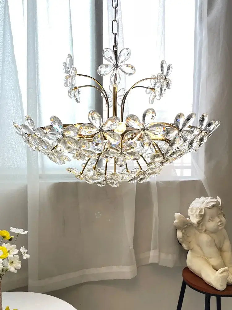 A modern gold decorbites crystal flower chandelier with clear faceted crystals for living room lighting