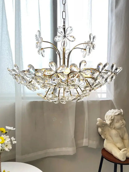 A modern gold decorbites crystal flower chandelier with clear faceted crystals for living room lighting