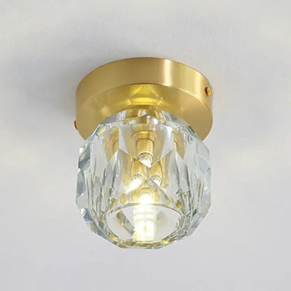 A clear faceted crystal globe with a gold metal base for modern gold decorbites crystal led ceiling light