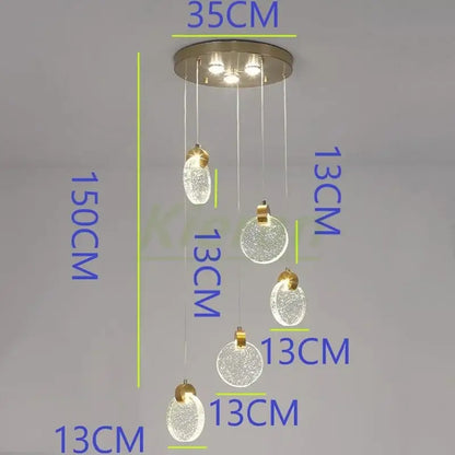 Modern gold decorbites crystal led chandelier with five frosted glass orbs and brushed metal ceiling mount for bedroom use