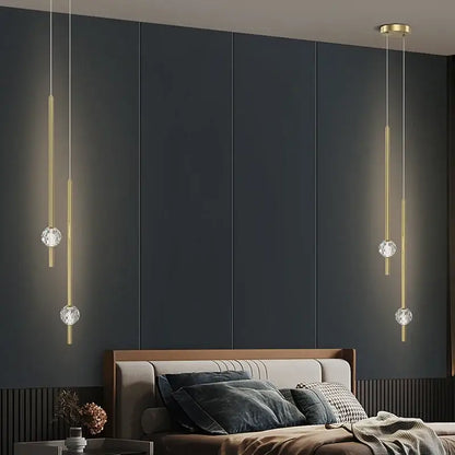 Modern gold decorbites crystal led chandelier features gold-toned pendant lights with crystal spheres for elegant bedroom decor