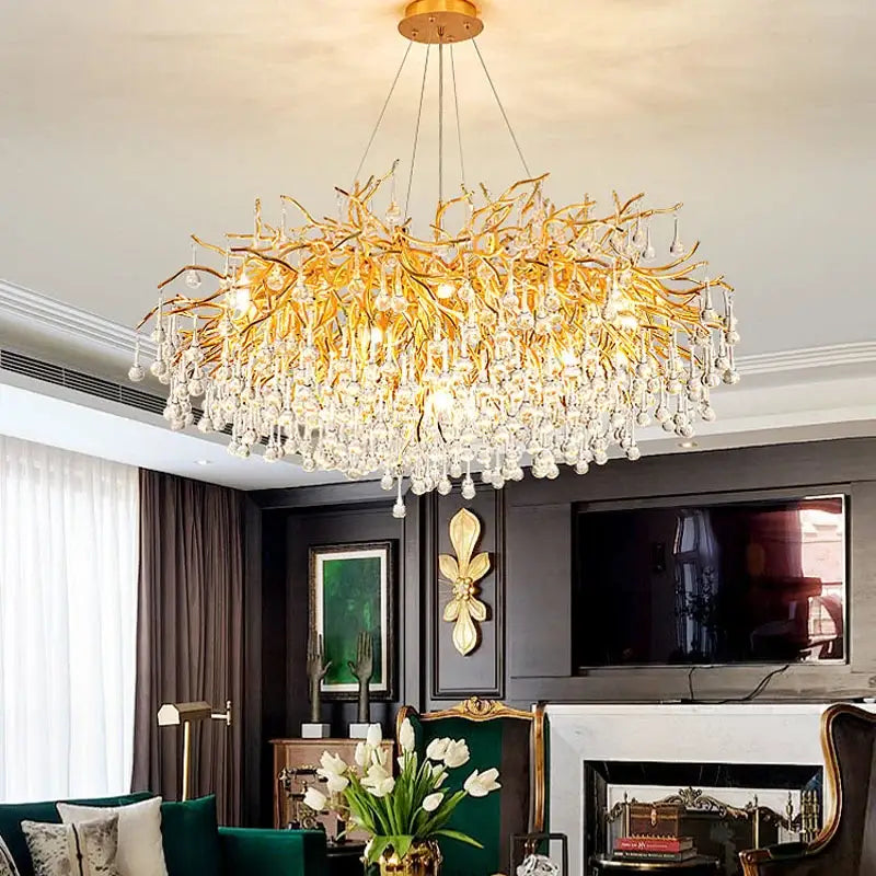 Modern gold decorbites crystal led chandelier features a golden branch design with cascading clear crystal droplets for dining rooms