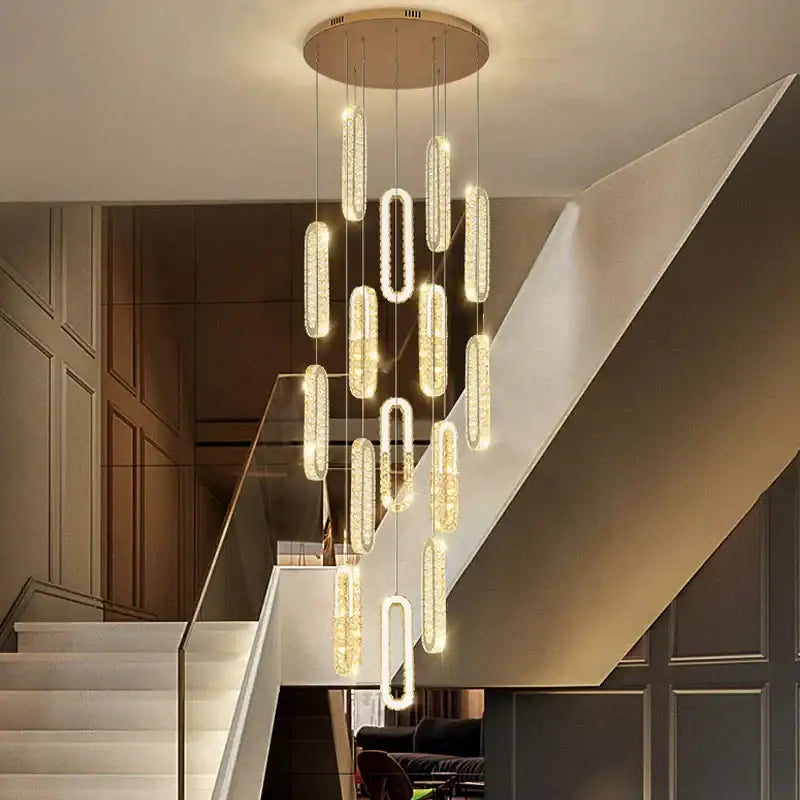 Modern gold decorbites crystal led chandelier with circular mount and cascading oval lights for living room staircase