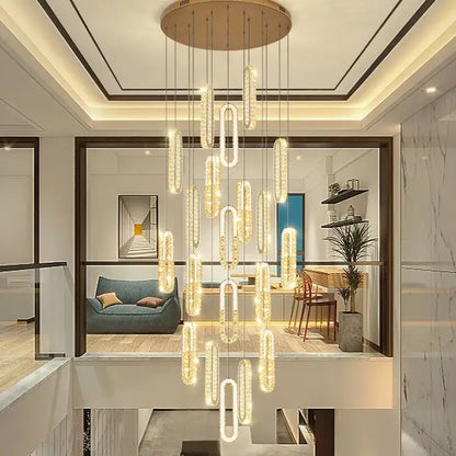 A modern gold decorbites crystal led chandelier with cylindrical glass elements for living room or staircase lighting