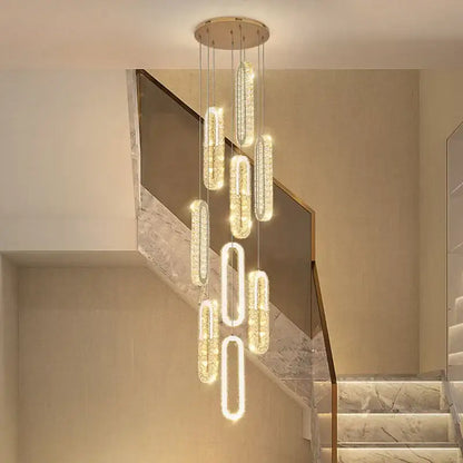 Modern gold decorbites crystal led chandelier with cascading cylindrical lights in warm glow for living room staircase